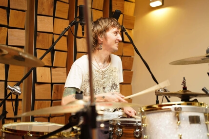 Drummer recording drums